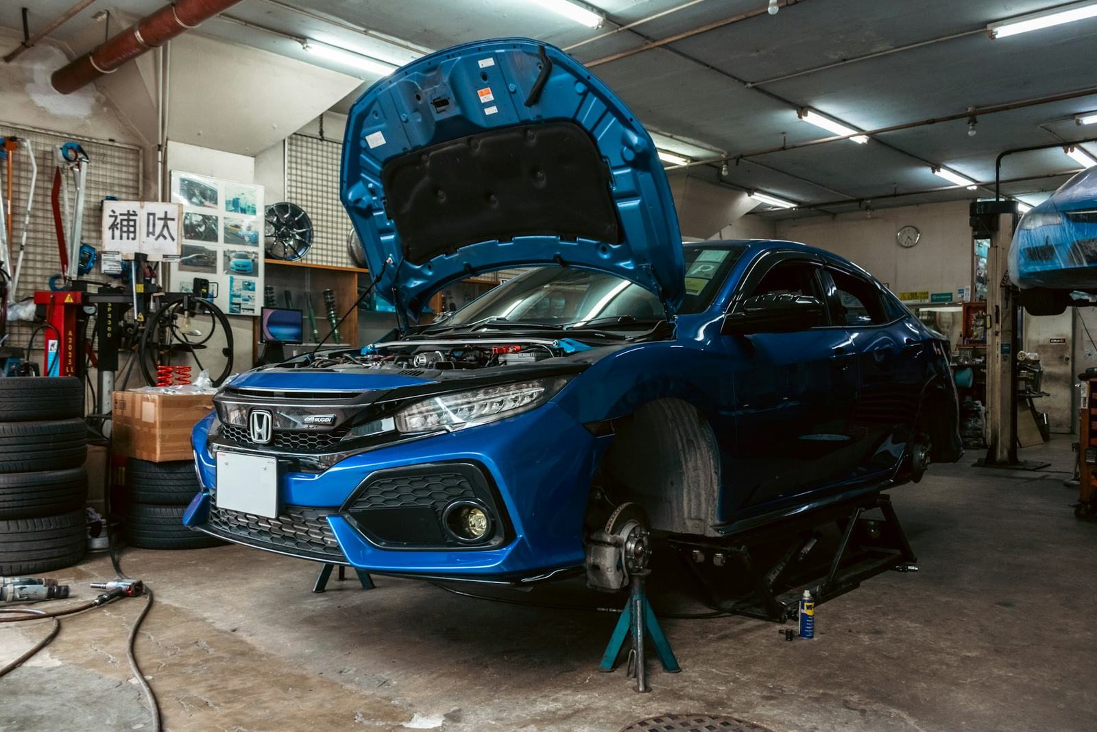 A car raised on stands in the workshop